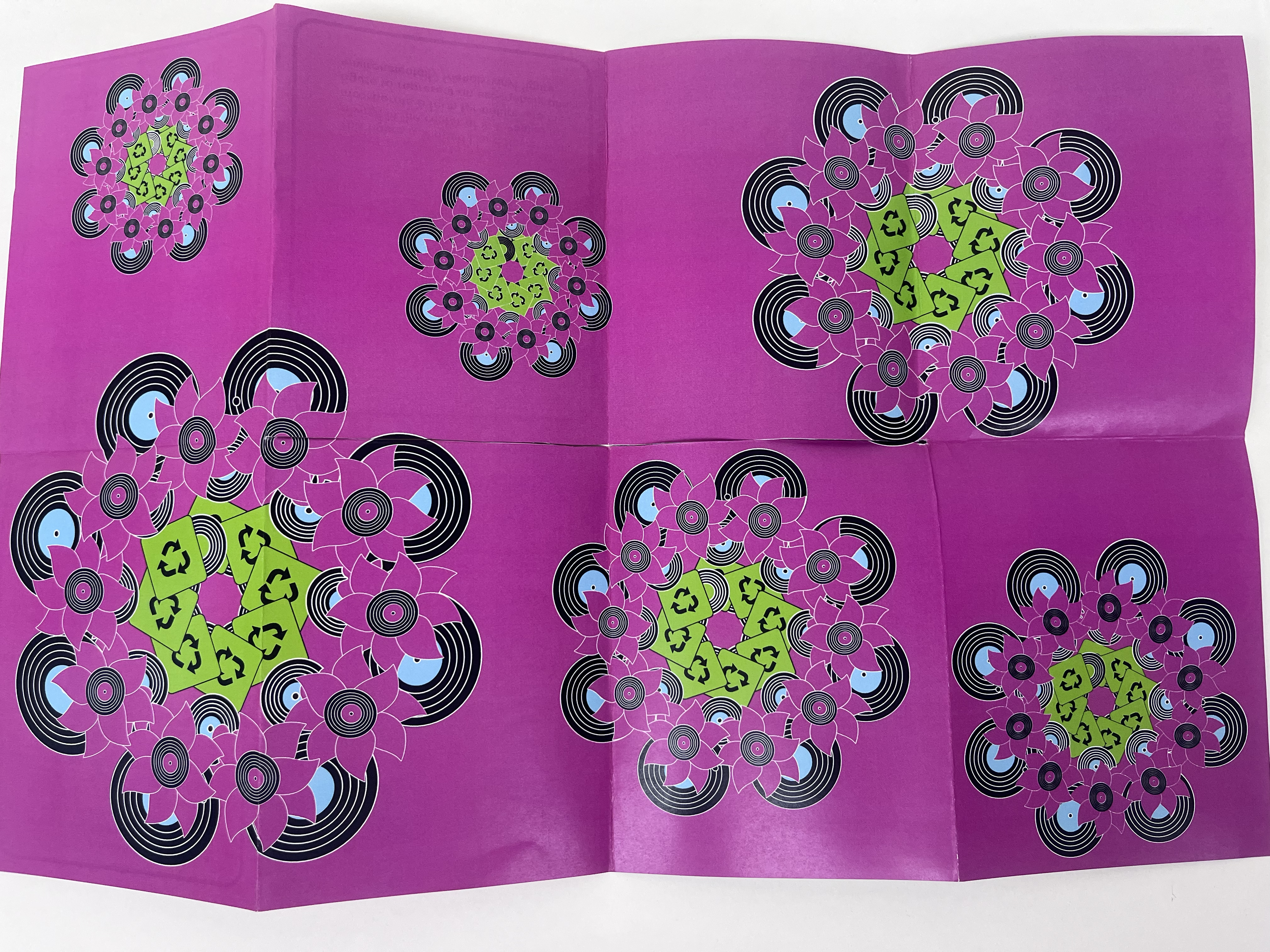 full unfolded zine back design. design contains pink background along with illistrations of records making up larger illistrations of fllowers 