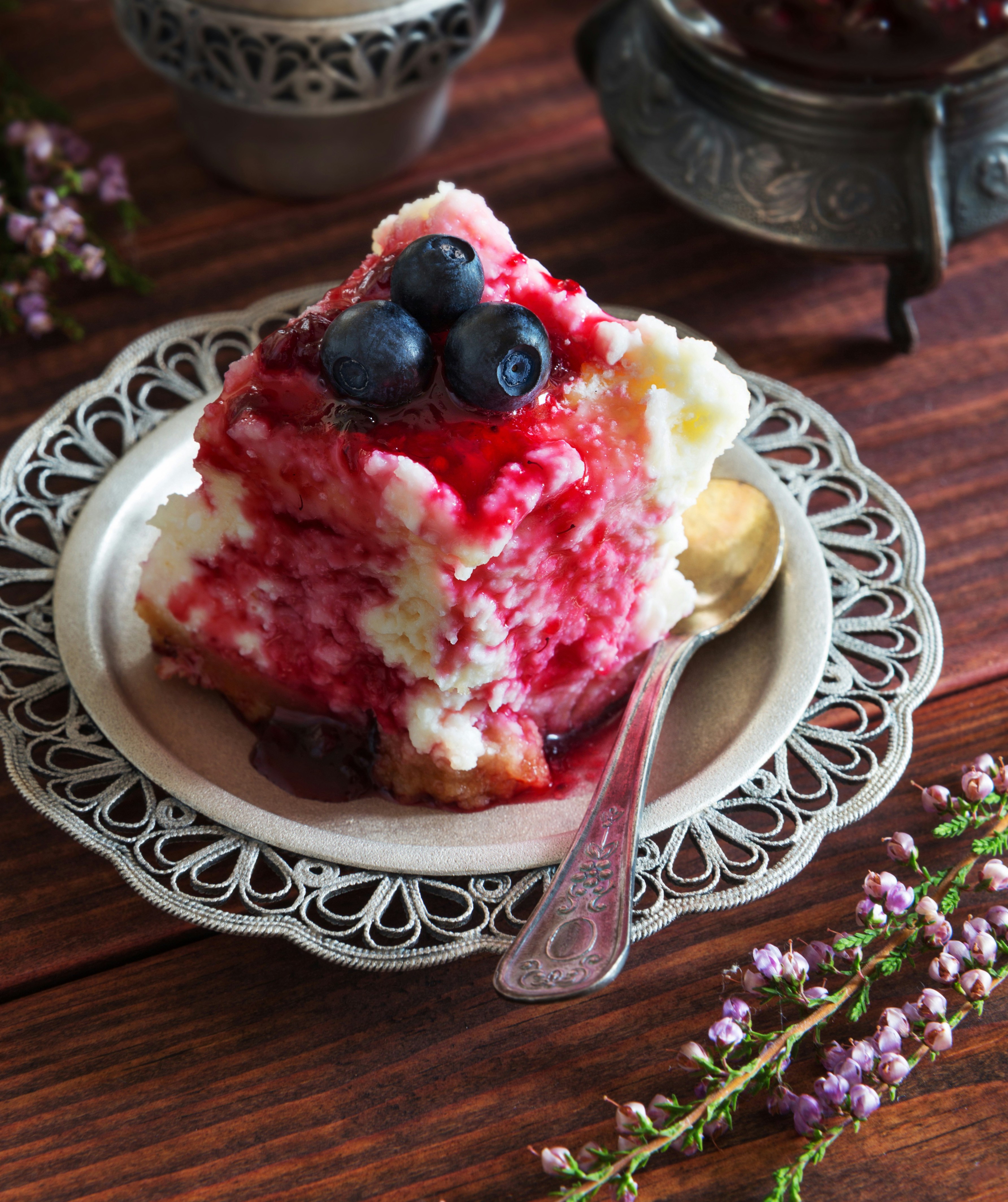  a slice of sugar shots berry cobbler specialty dessert on a plate