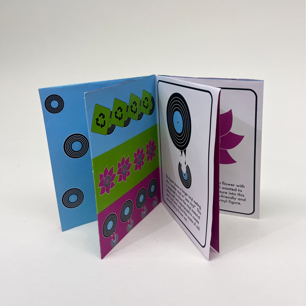 brght green blue and pink zine booklet featuring symbols of resistance about recycling vinyl records